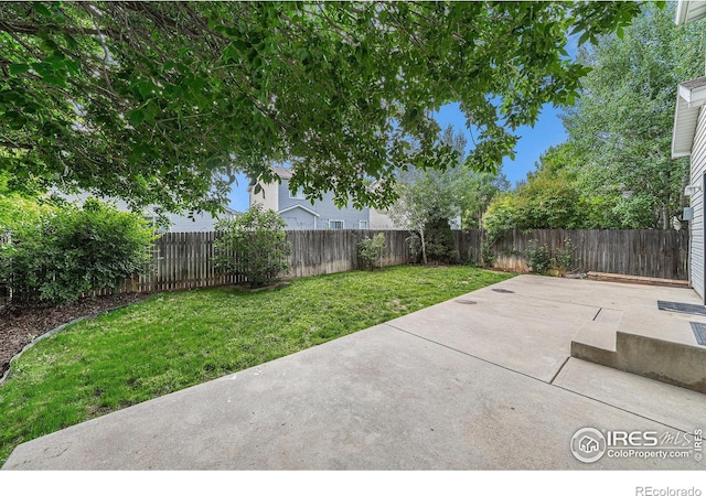3314 Planter Way, Fort Collins, CO 80526 - fenced backyard featuring a patio