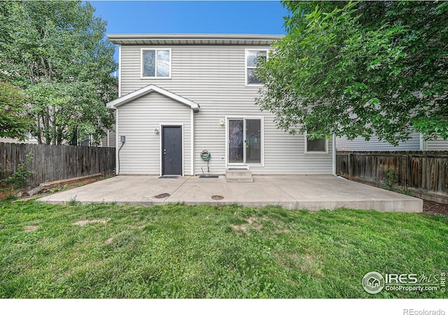 3314 Planter Way, Fort Collins, CO 80526 - back of property featuring a patio and a fenced backyard