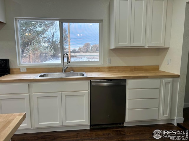 809 Warren St, Weldona, CO 80653 - kitchen with dishwasher, wood counters, and white cabinets