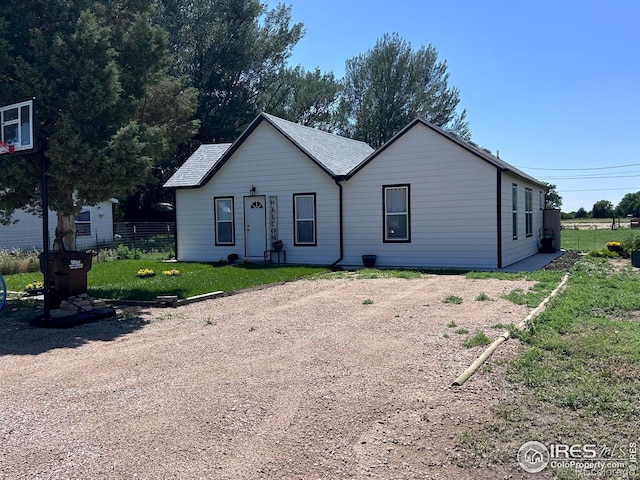 809 Warren St, Weldona, CO 80653 - view of front of house featuring dirt driveway