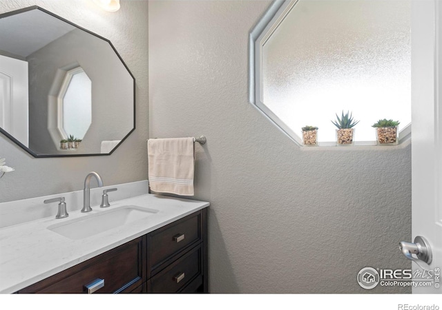 6042 Carmon Dr, Windsor, CO 80550 - bathroom featuring vanity