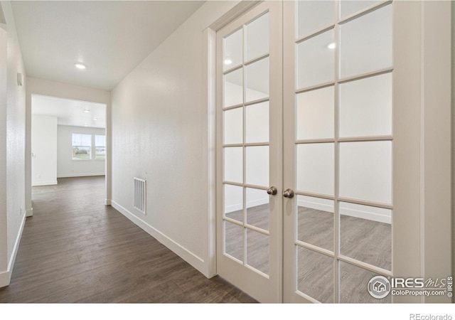 1842 Chaffee Crest Dr, Berthoud, CO 80513 - hallway featuring dark wood-style flooring, recessed lighting, and french doors