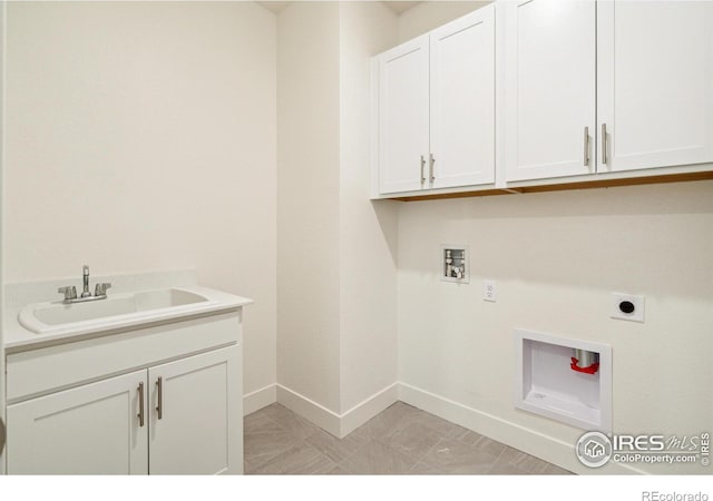 1842 Chaffee Crest Dr, Berthoud, CO 80513 - washroom featuring cabinet space, washer hookup, and electric dryer hookup