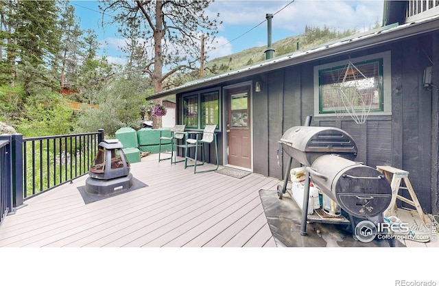 30 Falls Creek Dr, Bellvue, CO 80512 - wooden deck with area for grilling