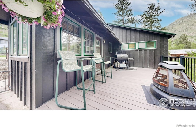 30 Falls Creek Dr, Bellvue, CO 80512 - wooden deck with grilling area and a mountain view