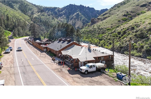 30 Falls Creek Dr, Bellvue, CO 80512 - view of mountain background featuring a heavily wooded area