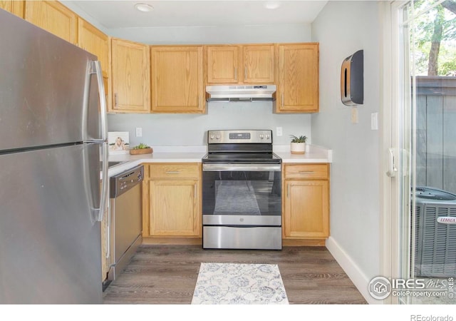 750 W Moorhead Cir Unit A, Boulder, CO 80305 - kitchen featuring stainless steel appliances, under cabinet range hood, light countertops, wood finished floors, and recessed lighting