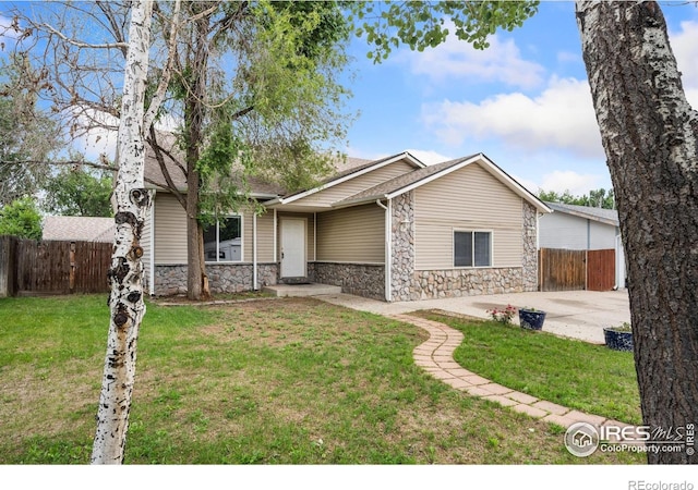 4740 Everglade Ct, Greeley, CO 80634 - mid-century home with stone siding
