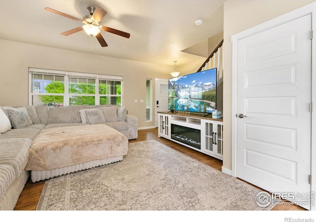 3001 Nebula Ct, Loveland, CO 80537 - living area with wood finished floors and a ceiling fan