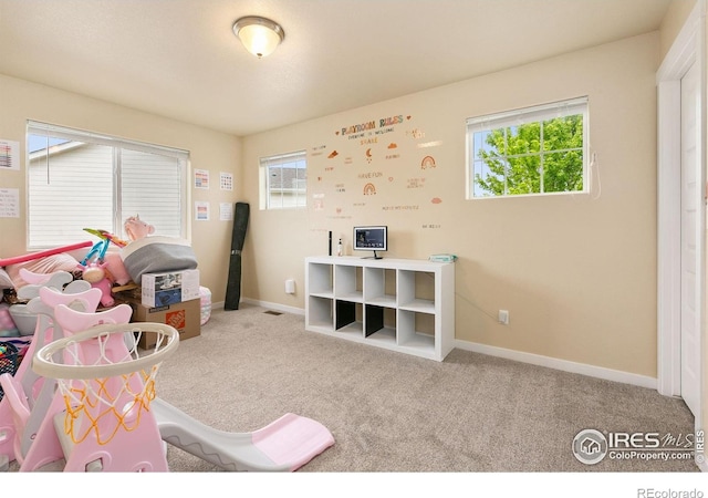 3001 Nebula Ct, Loveland, CO 80537 - game room with carpet floors and healthy amount of natural light