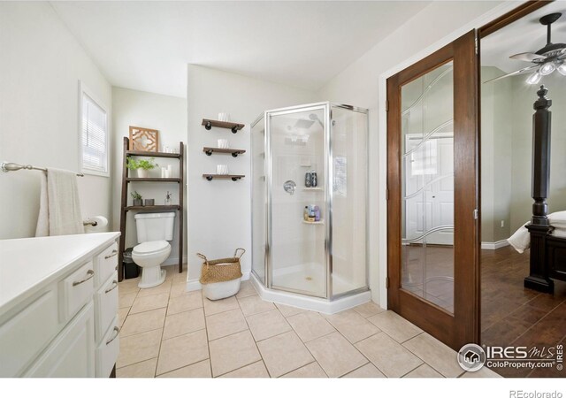34427 County Rd W, Hillrose, CO 80733 - full bath with a stall shower, vanity, a ceiling fan, and tile patterned floors