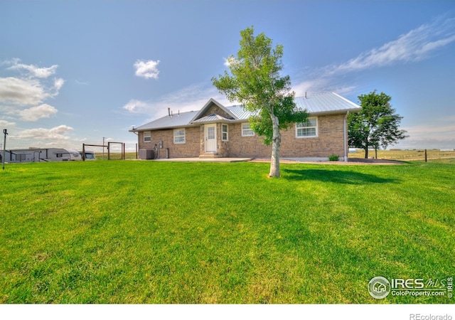 34427 County Rd W, Hillrose, CO 80733 - view of front of property featuring brick siding