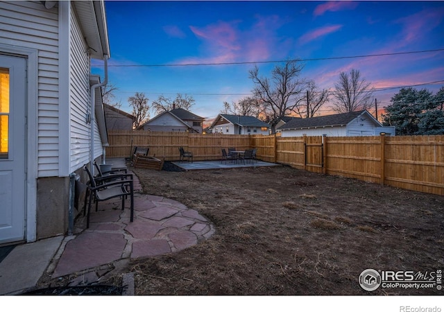 1417 14th St, Greeley, CO 80631 - fenced backyard with a patio area