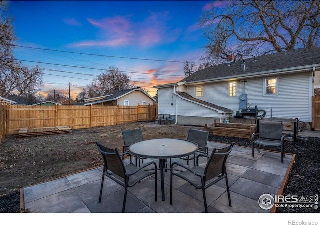 1417 14th St, Greeley, CO 80631 - fenced backyard featuring outdoor dining space and a patio