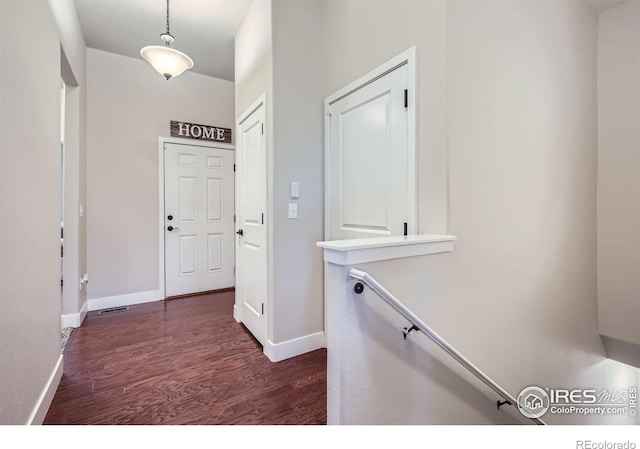 825 Forest Canyon Rd, Severance, CO 80550 - hall featuring dark wood-style floors and baseboards