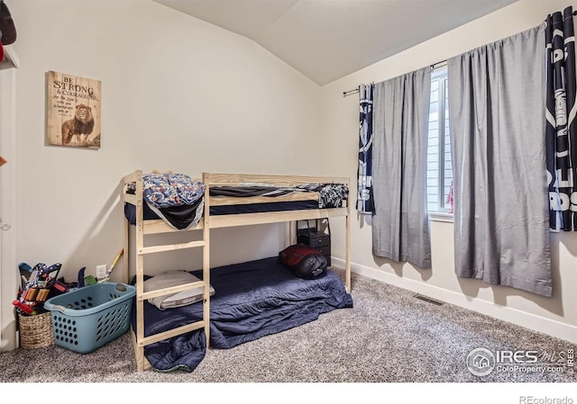 825 Forest Canyon Rd, Severance, CO 80550 - carpeted bedroom featuring vaulted ceiling and baseboards