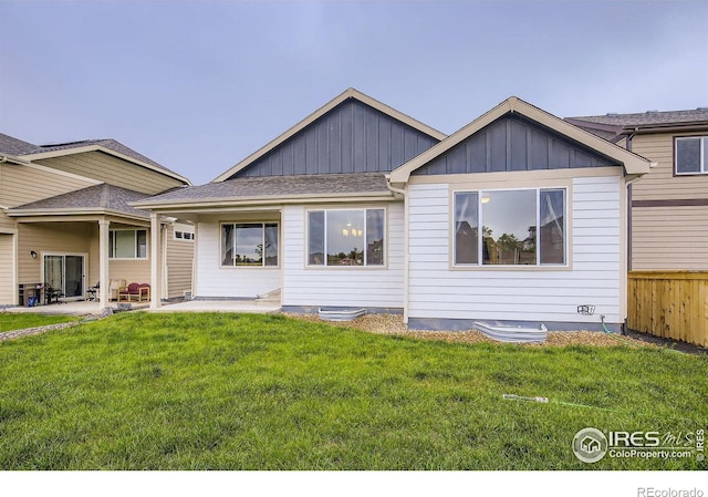 825 Forest Canyon Rd, Severance, CO 80550 - rear view of property featuring board and batten siding and a patio