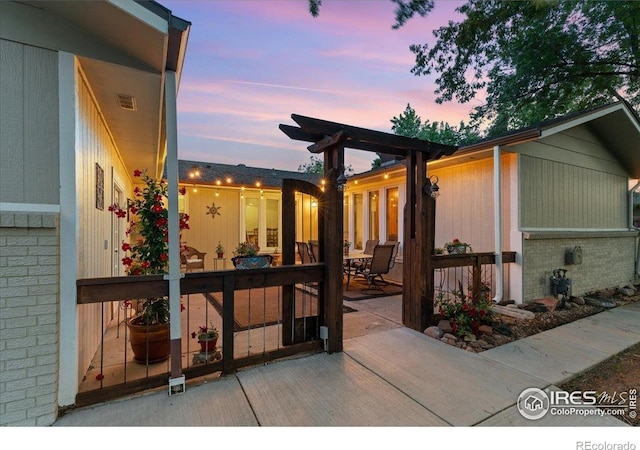 3421 Surrey Ln, Fort Collins, CO 80524 - view of patio terrace at dusk