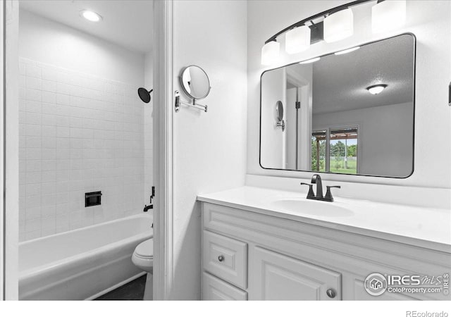 3421 Surrey Ln, Fort Collins, CO 80524 - bathroom with vanity, shower / washtub combination, and a textured ceiling