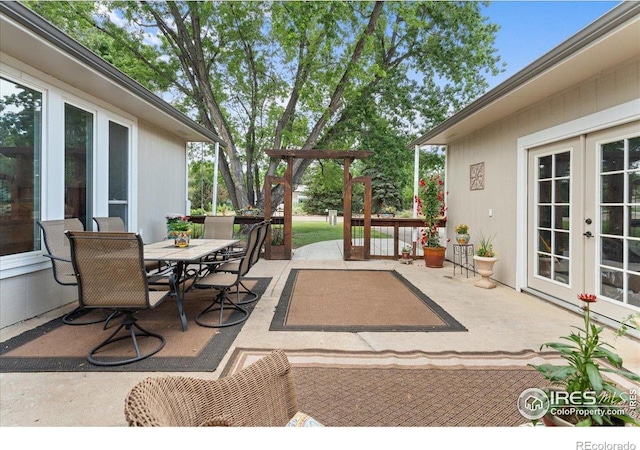 3421 Surrey Ln, Fort Collins, CO 80524 - view of patio / terrace with french doors and outdoor dining space