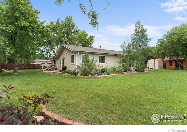3421 Surrey Ln, Fort Collins, CO 80524 - view of yard with a storage unit