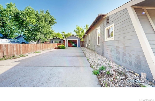 143 W 10th St, Loveland, CO 80537 - view of property exterior featuring driveway