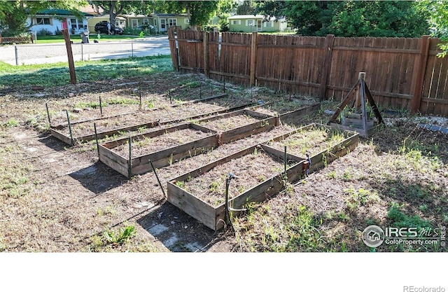143 W 10th St, Loveland, CO 80537 - view of yard with a vegetable garden