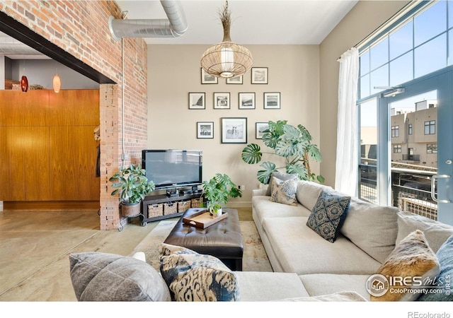 2500 Walnut St Unit 201, Denver, CO 80205 - living room with concrete floors
