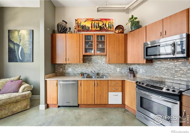 2500 Walnut St Unit 201, Denver, CO 80205 - kitchen featuring stainless steel appliances, finished concrete flooring, decorative backsplash, and glass insert cabinets