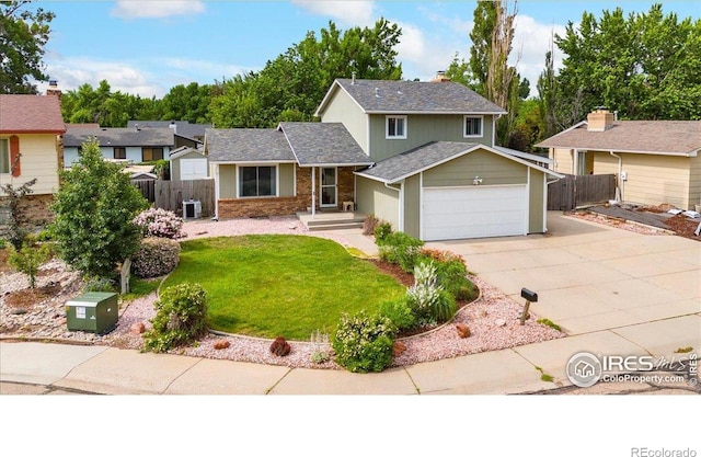 4324 W 22nd St, Greeley, CO 80634 - traditional home with driveway, an attached garage, and a chimney