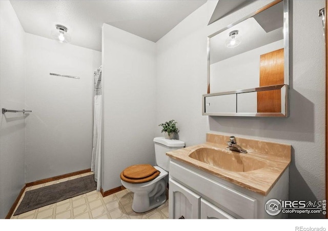 4324 W 22nd St, Greeley, CO 80634 - bathroom with vanity, tile patterned floors, and a shower with curtain