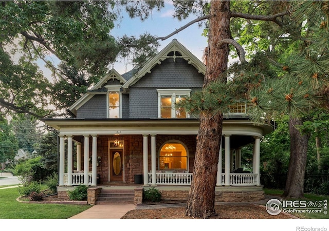 505 Pine St, Boulder, CO 80302 - victorian house featuring a porch and stone siding