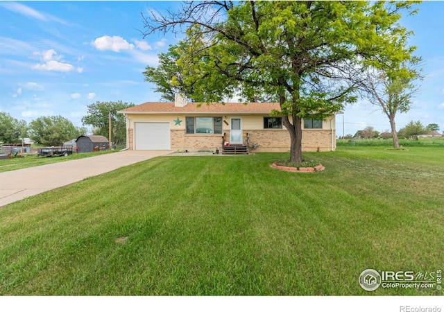 2110 Charro Ave, Longmont, CO 80504 - ranch-style house with driveway, brick siding, a garage, a front yard, and entry steps