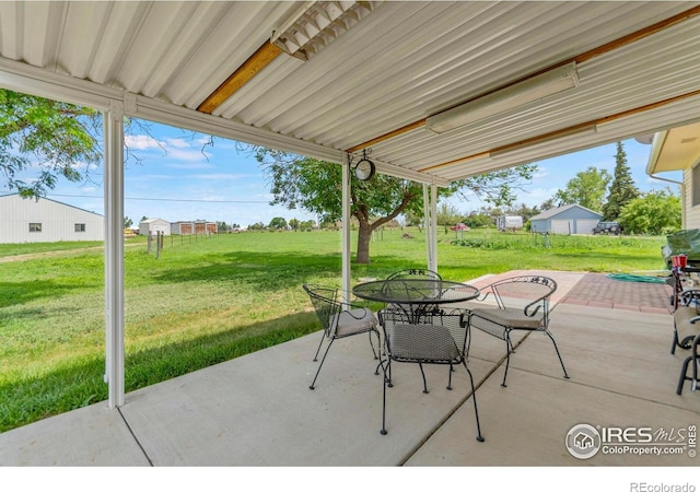 2110 Charro Ave, Longmont, CO 80504 - view of patio / terrace with outdoor dining space