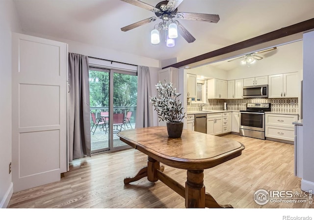 2912 Worthington Ave, Fort Collins, CO 80526 - dining space with a ceiling fan, light wood-type flooring, and lofted ceiling