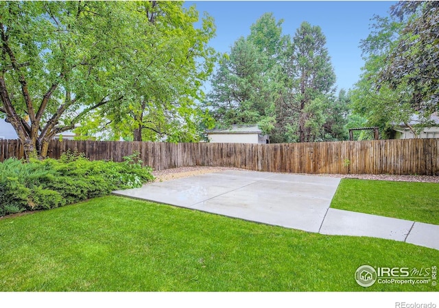 2912 Worthington Ave, Fort Collins, CO 80526 - fenced backyard with a patio area