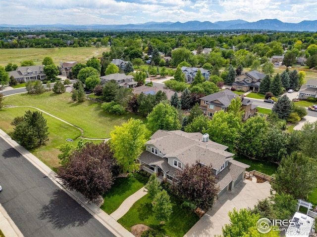 1231 Hawk Ridge Rd, Lafayette, CO 80026 - aerial view of residential area featuring a mountainous background