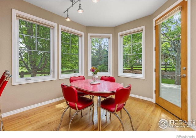1231 Hawk Ridge Rd, Lafayette, CO 80026 - dining room with baseboards and wood finished floors