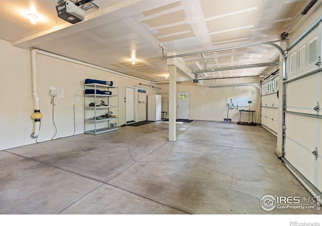 1231 Hawk Ridge Rd, Lafayette, CO 80026 - garage featuring a garage door opener
