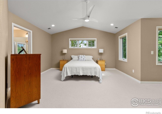 1231 Hawk Ridge Rd, Lafayette, CO 80026 - carpeted bedroom with vaulted ceiling, multiple windows, ceiling fan, and recessed lighting