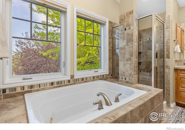 1231 Hawk Ridge Rd, Lafayette, CO 80026 - full bath with vanity, a whirlpool tub, and a shower stall