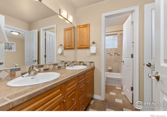 1231 Hawk Ridge Rd, Lafayette, CO 80026 - bathroom featuring double vanity and  shower combination