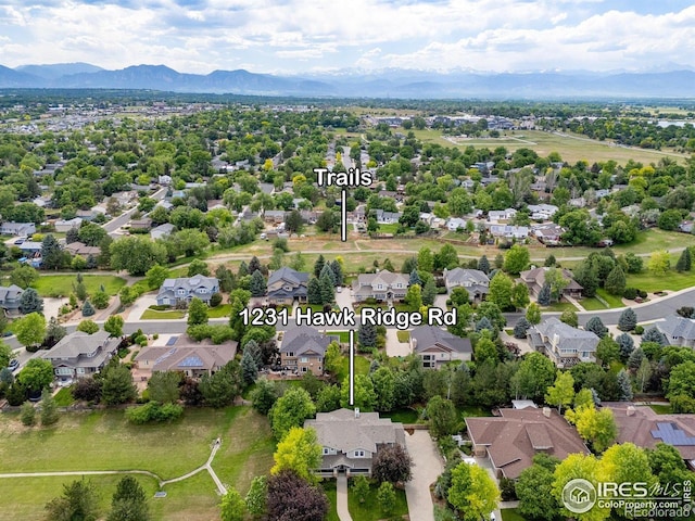 1231 Hawk Ridge Rd, Lafayette, CO 80026 - aerial view of residential area with a mountainous background