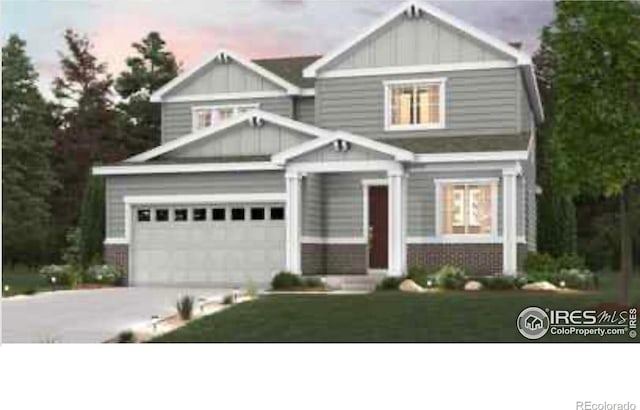 850 Mesic Ln, Windsor, CO 80550 - craftsman-style home with board and batten siding, driveway, an attached garage, and a front lawn