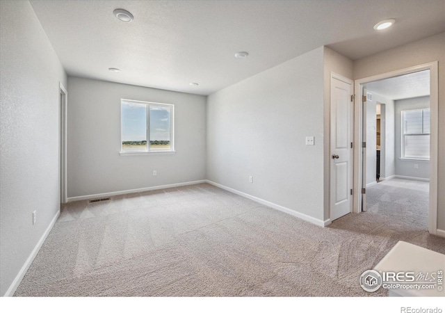 850 Mesic Ln, Windsor, CO 80550 - carpeted spare room featuring healthy amount of natural light