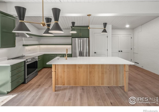 2009 18th Ave, Greeley, CO 80631 - kitchen with green cabinets, appliances with stainless steel finishes, light countertops, brick wall, and wood ceiling