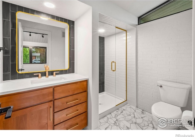 2009 18th Ave, Greeley, CO 80631 - bathroom with vanity, a shower stall, marble finish flooring, and recessed lighting