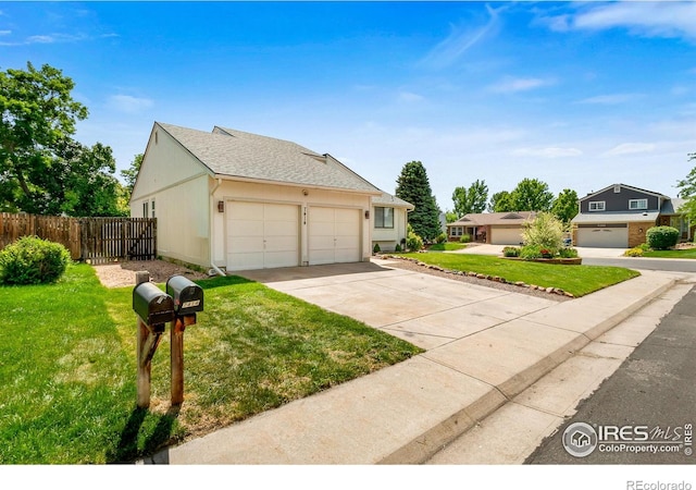 7414 Benton St, Arvada, CO 80003 - view of front of house featuring a garage, driveway, and roof with shingles
