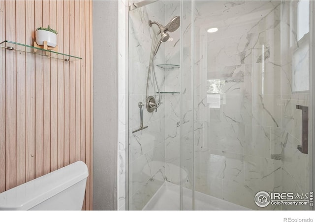 7414 Benton St, Arvada, CO 80003 - bathroom with toilet and a marble finish shower