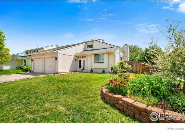 7414 Benton St, Arvada, CO 80003 - view of front of house with an attached garage, driveway, and a chimney